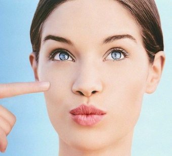 Kaip padaryti, kad ilgoji merginos nosis mažiau pastebima