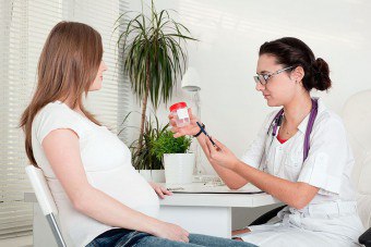 Kan jag rengöra tarmarna under graviditeten med en lavemang?
